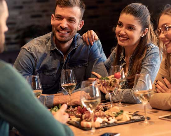 People eating at restaurant table